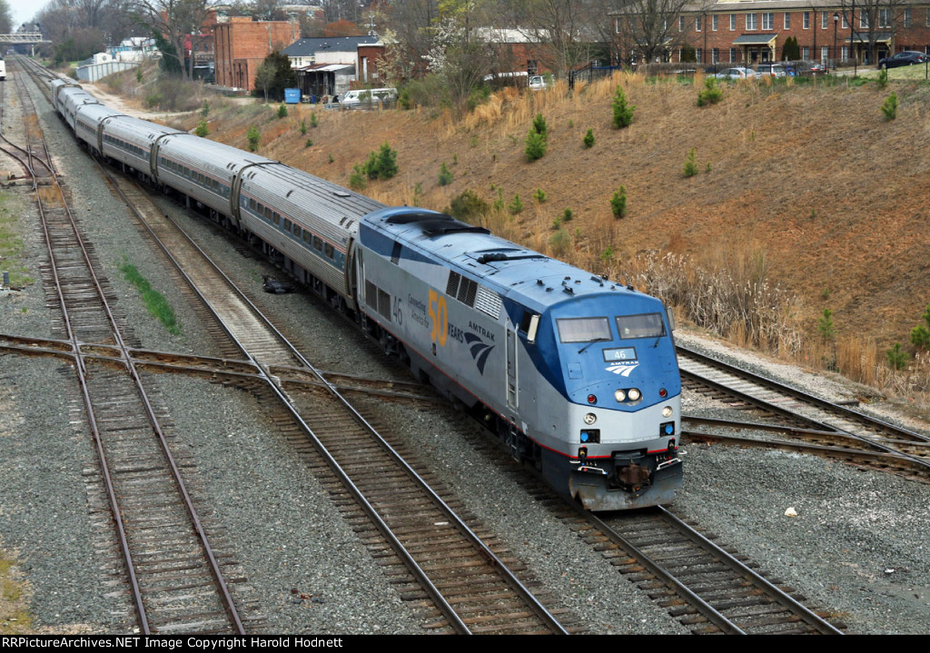 AMTK 46 leads train P080-16 across Boylan Junction